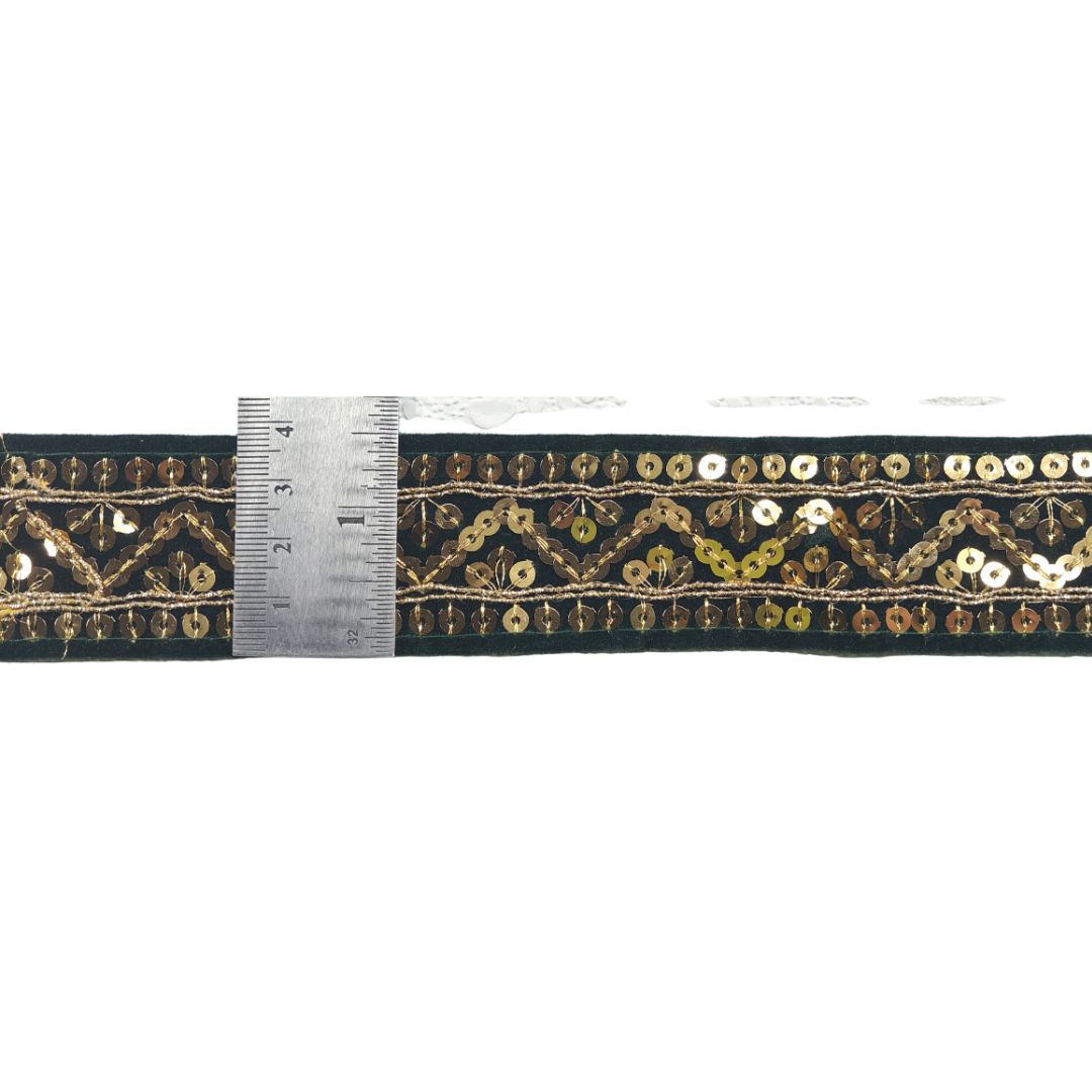 Decorative ribbon with gold and green pattern on a white background